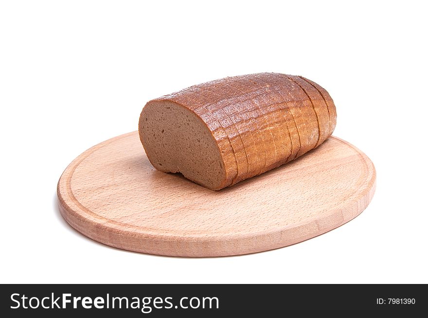 Long loaf and round board isolated on a white background. Long loaf and round board isolated on a white background.