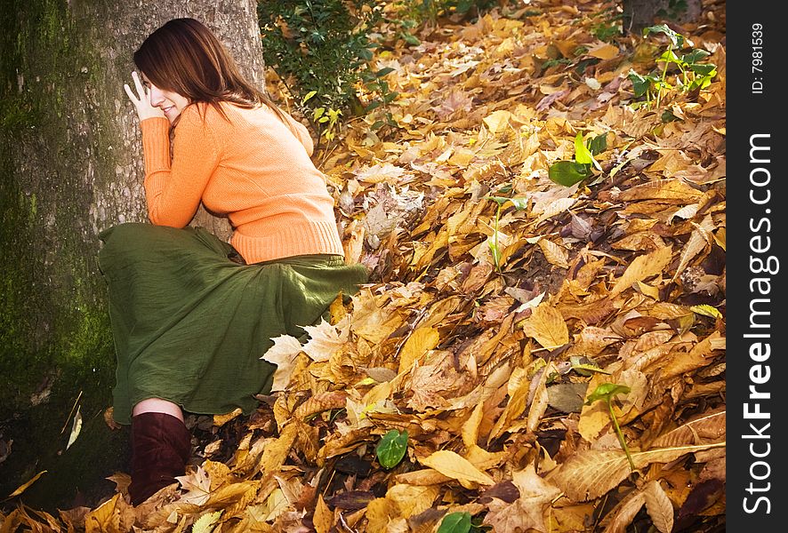 Young smiling woman in nature.