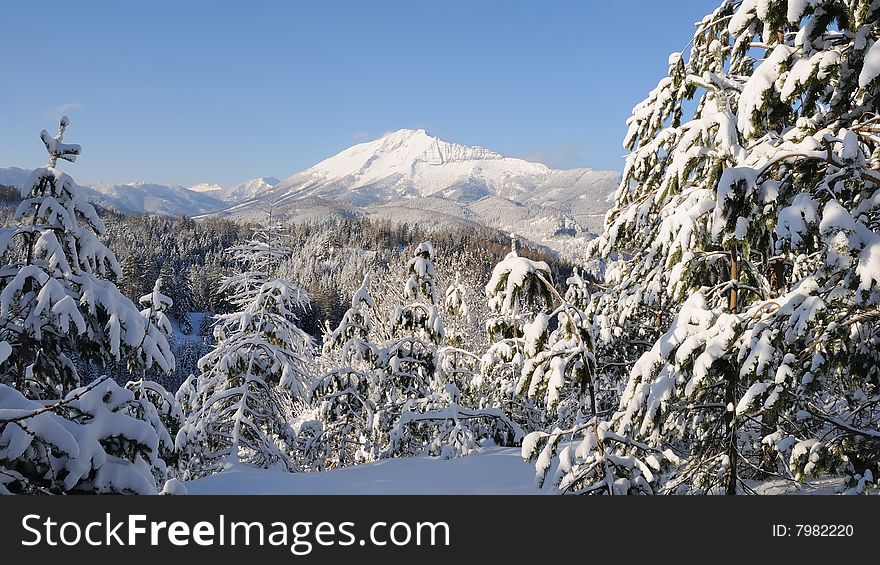 Landscape with mountain peak in winter with snow. Landscape with mountain peak in winter with snow