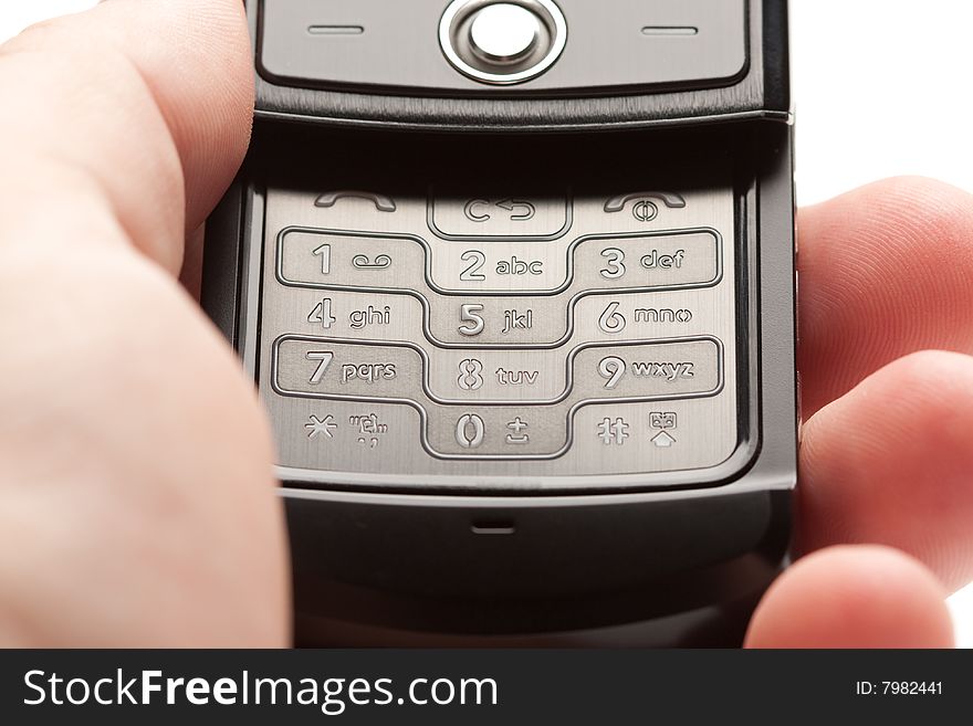 Male Hand Holding Grey Cell Phone Image. Male Hand Holding Grey Cell Phone Image