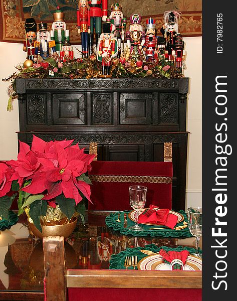 A table is ornately decorated for Christmas. A table is ornately decorated for Christmas.