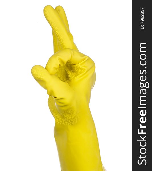 A hand in a yellow rubber glove giving the OK sign