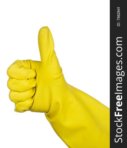 A hand in a yellow rubber glove giving the Thumbs up sign