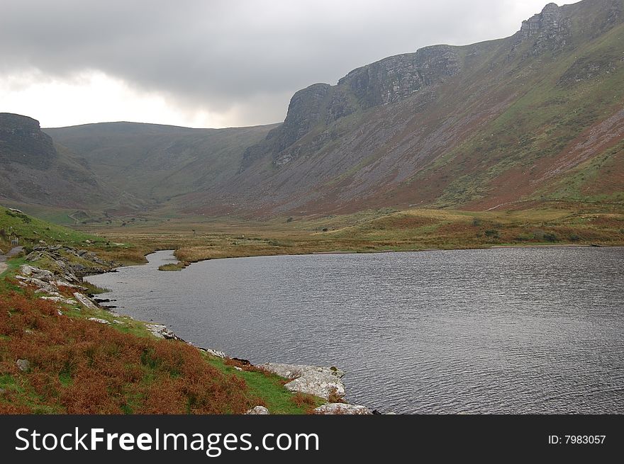 Dark Clouds over Anascaul Lakein Kerry Ireland taken on a cold autumn afternoon