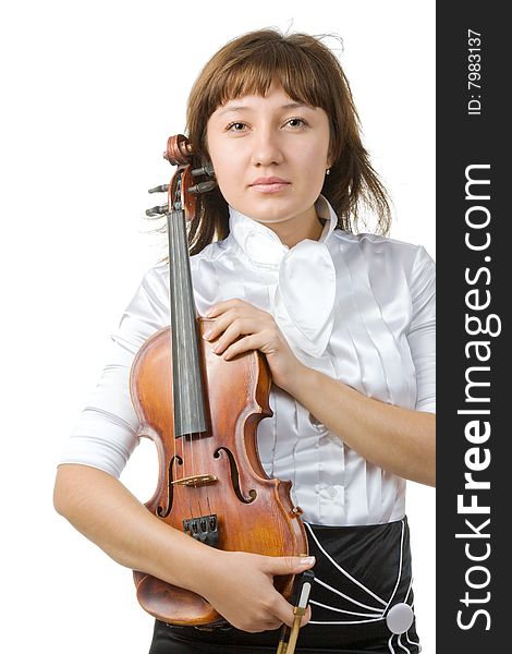 Girl in white blouse holding violin isolated over white. Girl in white blouse holding violin isolated over white