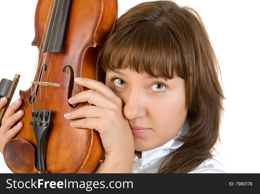 Girl in white blouse holding violin isolated over white. Girl in white blouse holding violin isolated over white