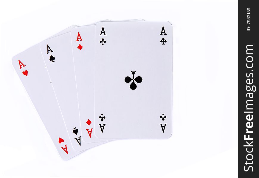 White playing cards four aces isolated closeup