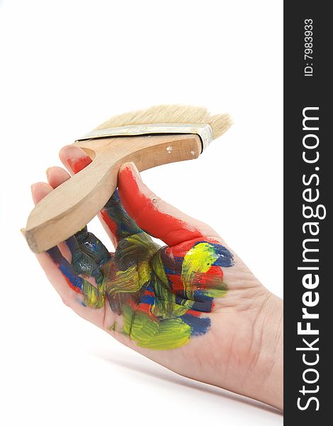 Colorful hand with paint brush