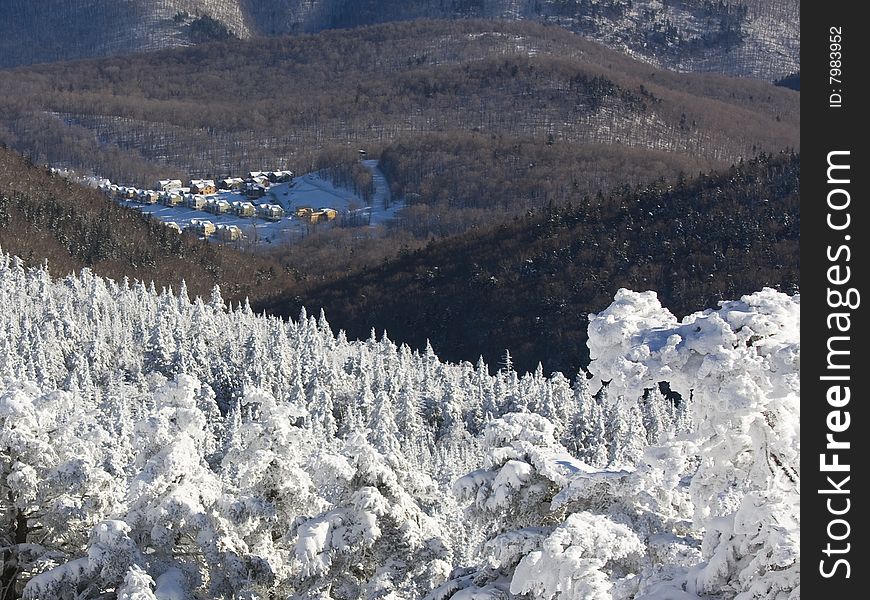 View of a village in the mountains in  the winter