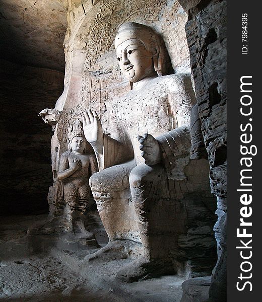 Yungang grottoes, Shanxi, China. Interior shot of one of the large statues. Yungang grottoes, Shanxi, China. Interior shot of one of the large statues.