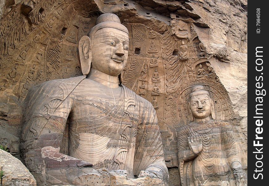 Yungang grottoes, Datong, China. Exterior view of the statues. Yungang grottoes, Datong, China. Exterior view of the statues.