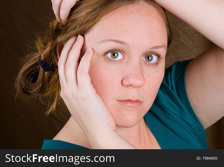 Beautiful image of a woman with large green eyes.