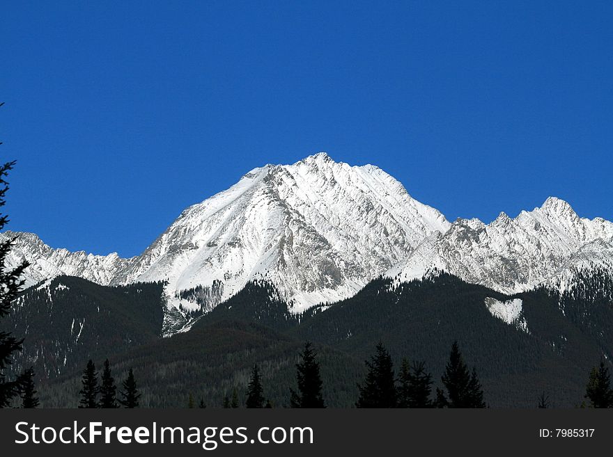 View of Canadian Rocky Mountains with snow on peaks. View of Canadian Rocky Mountains with snow on peaks