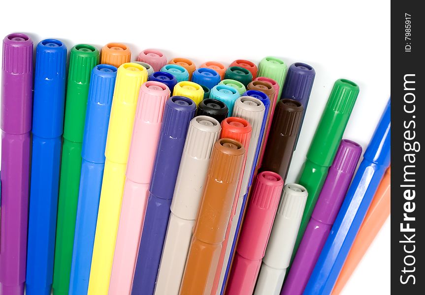 Many closed felt-tip pens, pastel and dark colors
