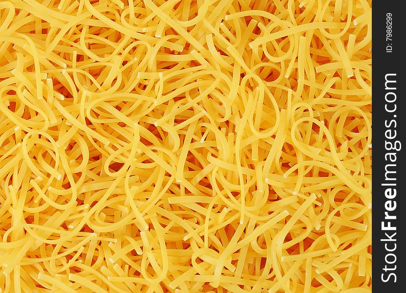 Background of bright yellow nuddles. Background of bright yellow nuddles