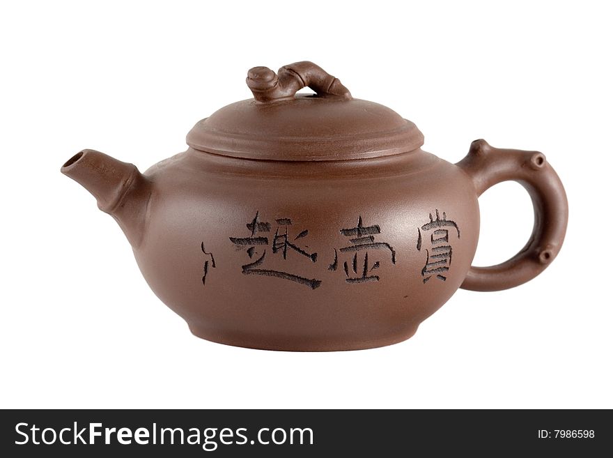 A clay teapot isolated on white