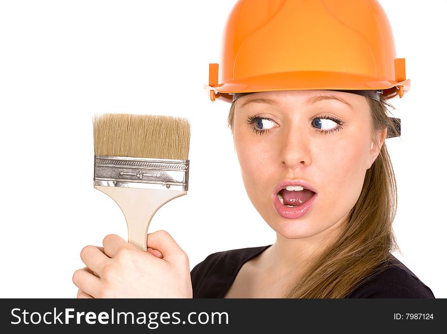 Pretty woman in yellow construction helmet with paintbrush. Isolated on white background