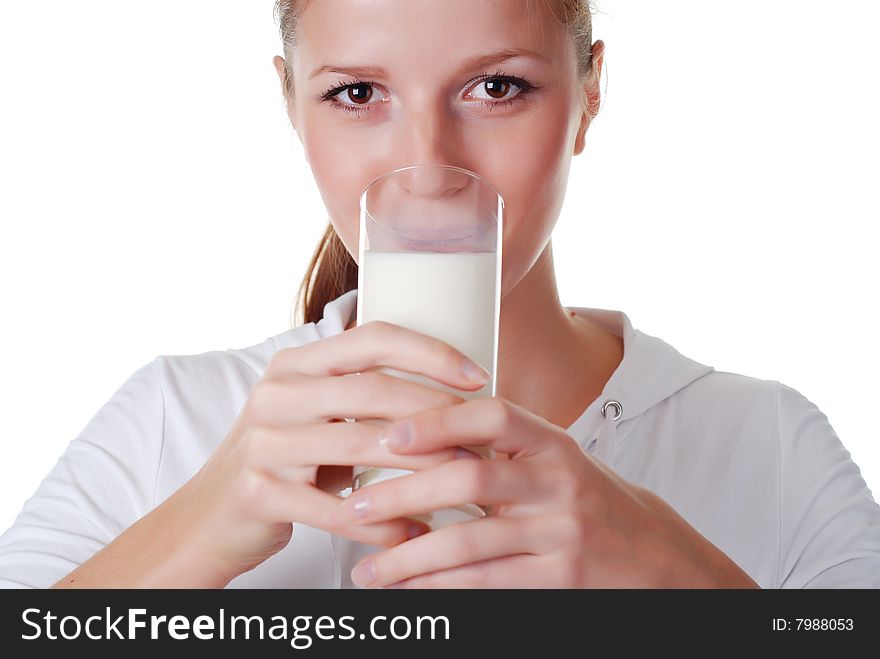 Young woman with glass of milk on white bacground