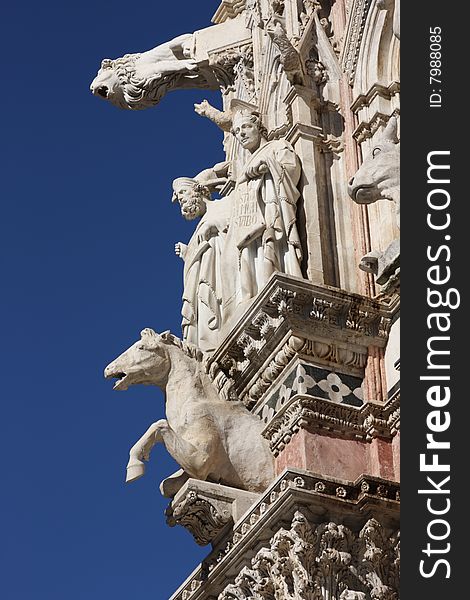 Architectural details of duomo cathedral in medieval town Siena,Tuscany,Italy. Architectural details of duomo cathedral in medieval town Siena,Tuscany,Italy