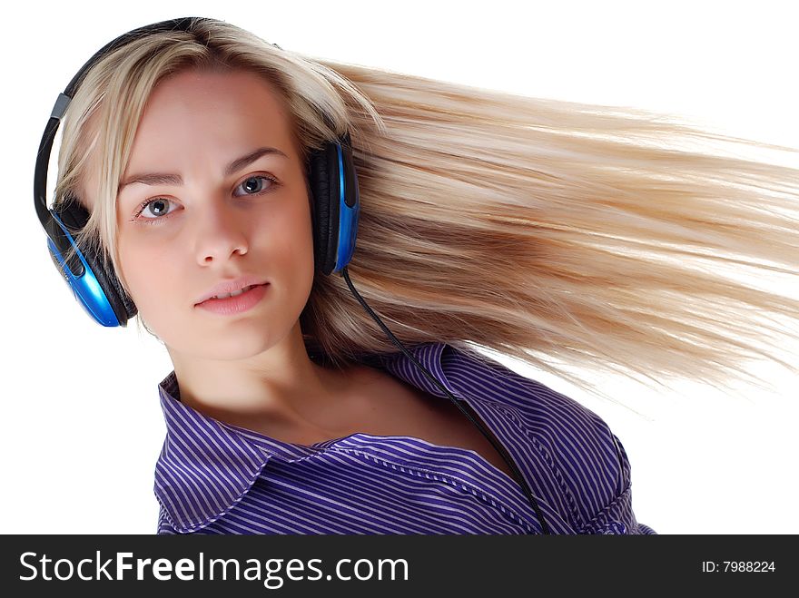 Young beautiful woman listening music with headpfones. Young beautiful woman listening music with headpfones