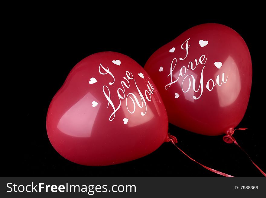Valentine Heart shape Balloons on black background. With inscription I Love You. Valentine Heart shape Balloons on black background. With inscription I Love You.