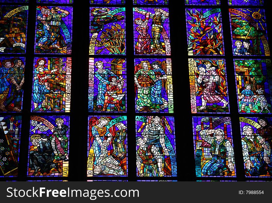 Colorful stained-glass window in St.Vitus cathedral in Czech capital Prague