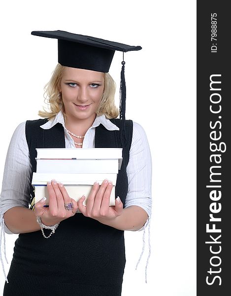 A happy woman with a motar board - maybe celebrating her sucessfull examination