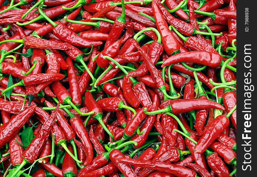 A pile of chilli peppers, detail. A pile of chilli peppers, detail.