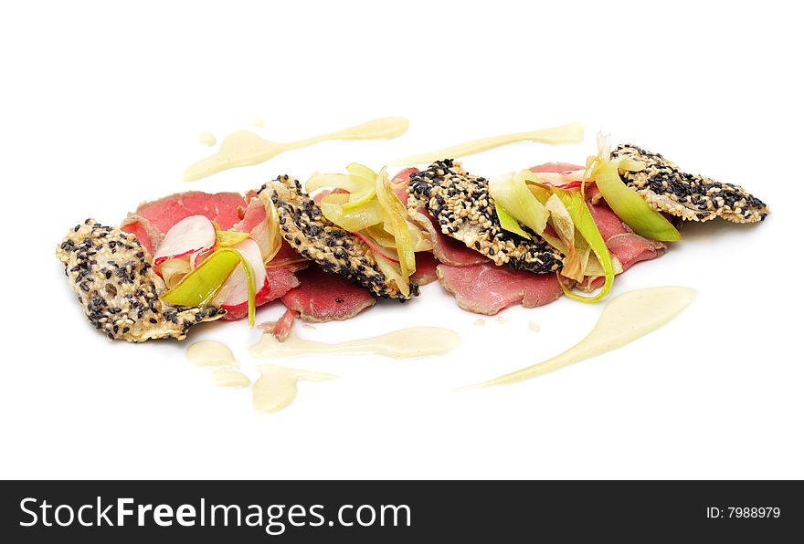 Veals Sashimi with Wasabi and Celery Chips over White Background