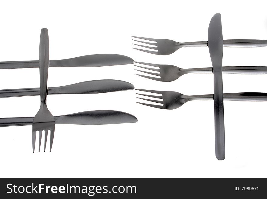 Knifes and forks isolated on a white background. Knifes and forks isolated on a white background.