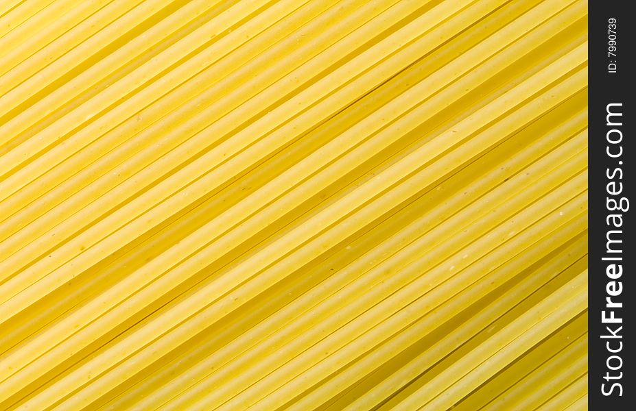 A close-up of a lot of raw spaghetti