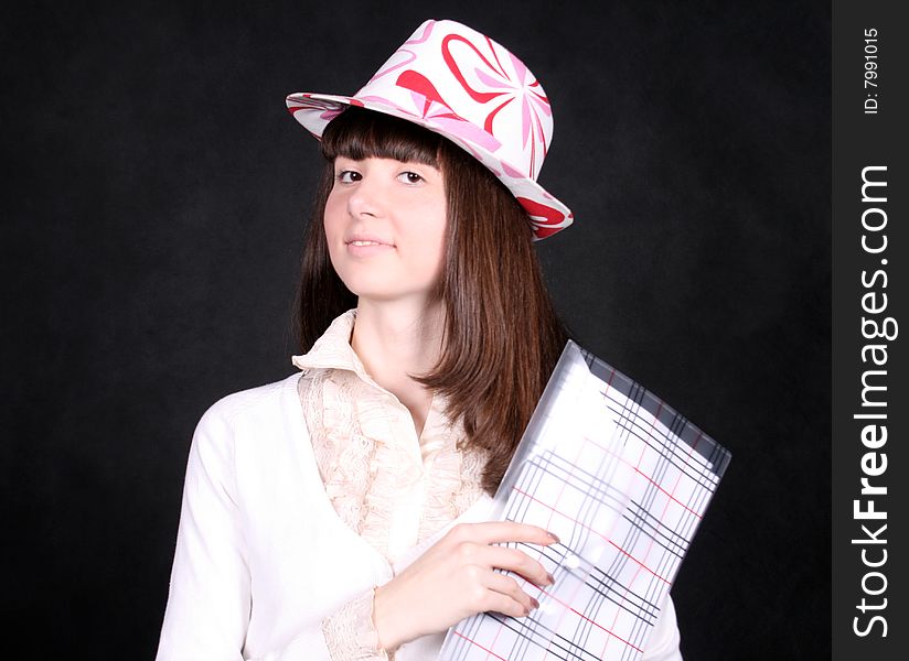 Girl holding a folder in her hands. Girl holding a folder in her hands