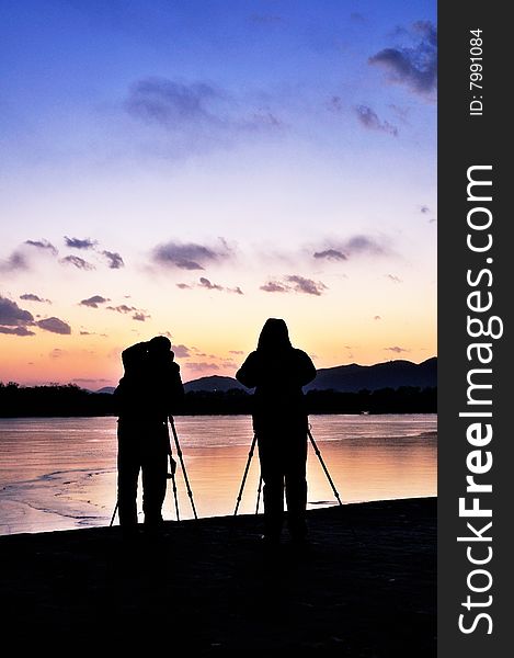 Photographer in Sunset,in The Summer Palace in winter