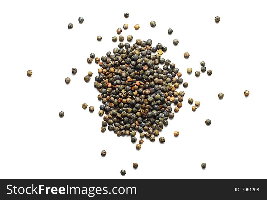 Black lentil isolated on white