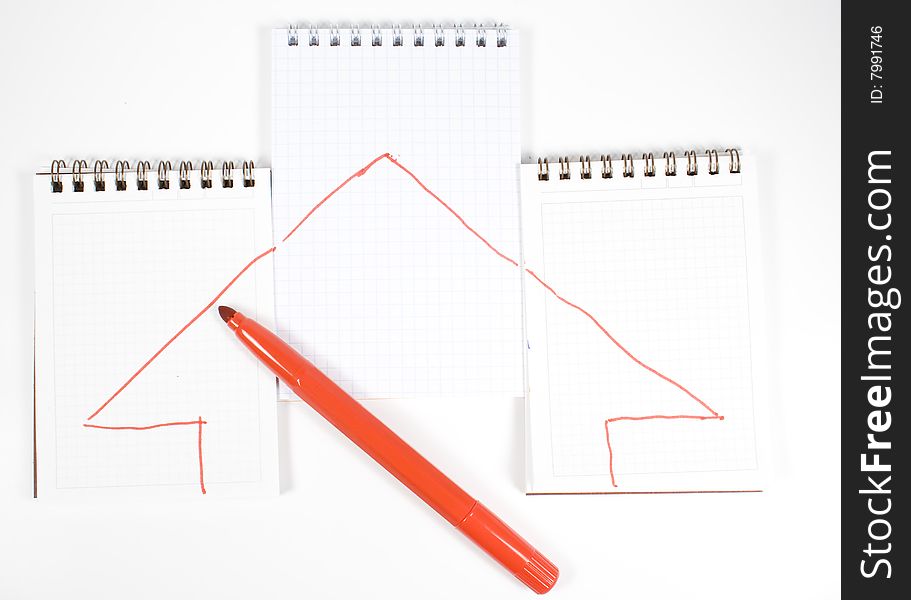 Three open notebooks with arrows and red felt-tip pen. Three open notebooks with arrows and red felt-tip pen