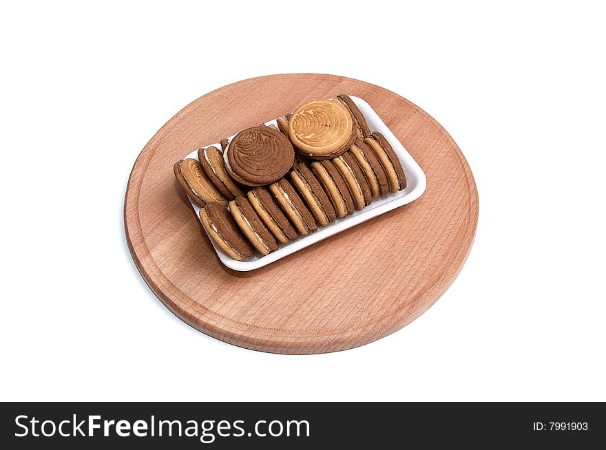 Cookie in the paper container isolated on a white background. Cookie in the paper container isolated on a white background.