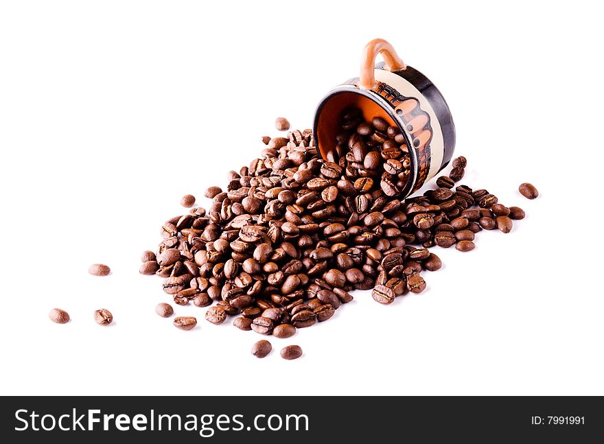 Pile Of Coffee Beans With A Cup