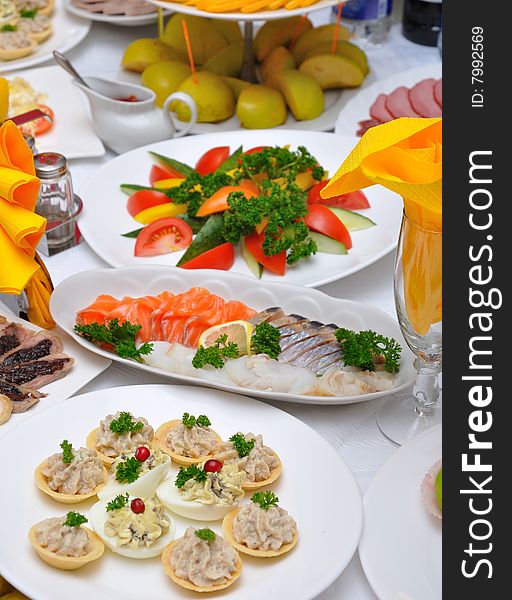 Table served with various dishes. Table served with various dishes