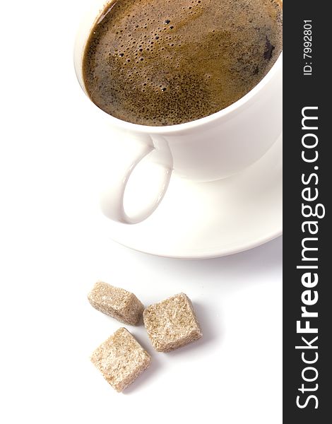 Coffee cup and sugar on a white background