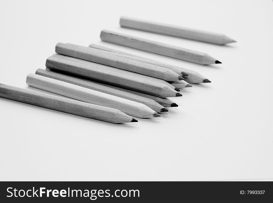 Pencils spread out over the table. Pencils spread out over the table