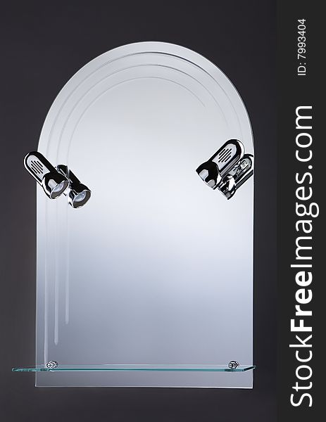 Mirror with lamps on grey background. Mirror with lamps on grey background