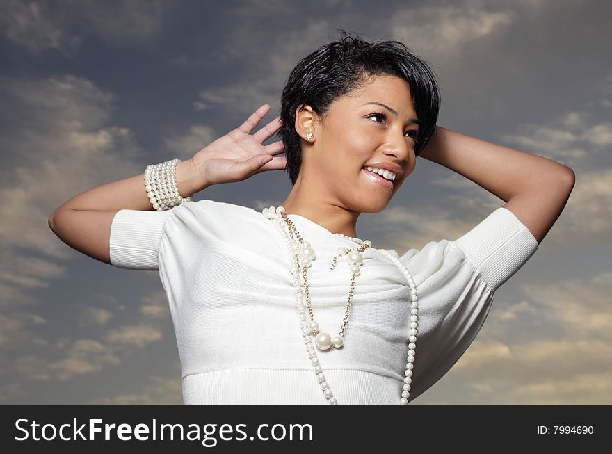 Woman Posing On A Dark Sky