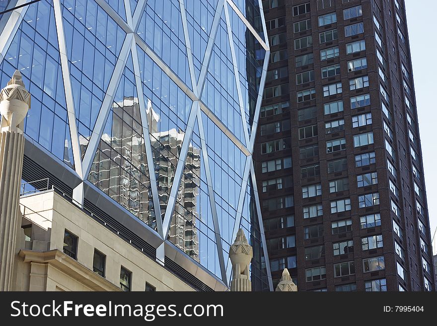 This is an image of buildings and reflections.