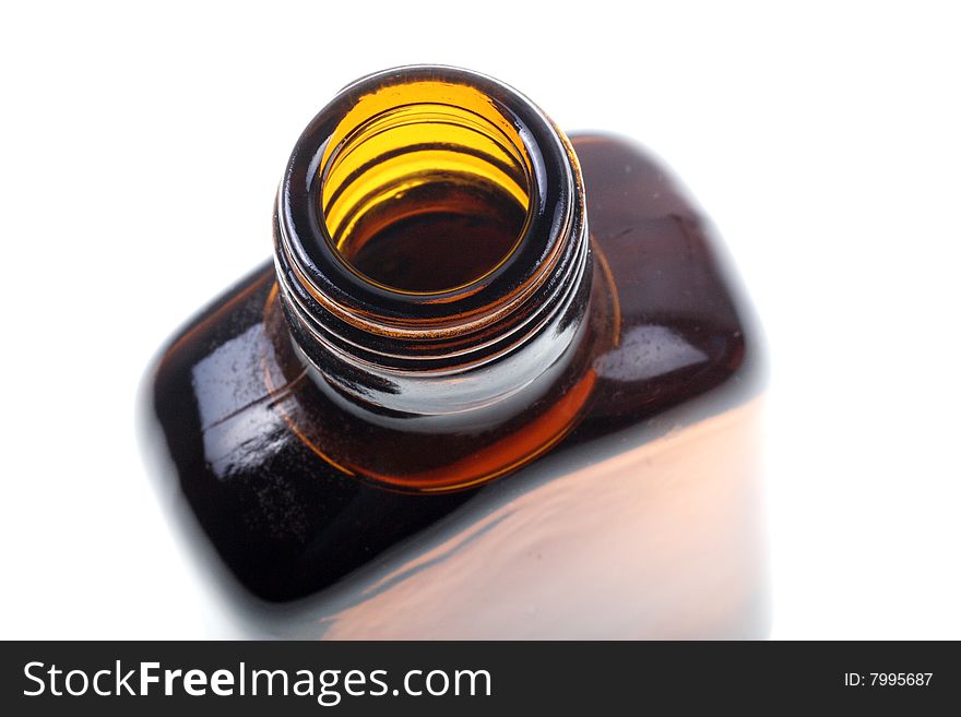 Whiskey bottle close-up isolated over a white background