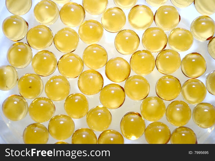 Yellow vitamin capsules with Omega 3 oil, isolated