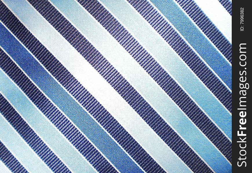 Detail of a tie with diagonal stripes. 	
Detail of a tie with diagonal stripes