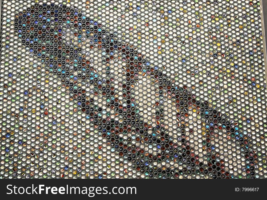 Abstract background with a leaf composed of glass beads