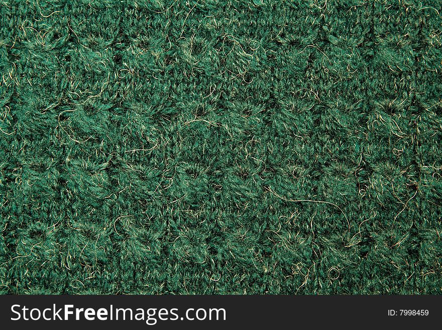 Photo of handmade Fabric Background, Green with gold