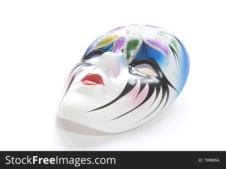 Beautiful ceramic mask on a white background