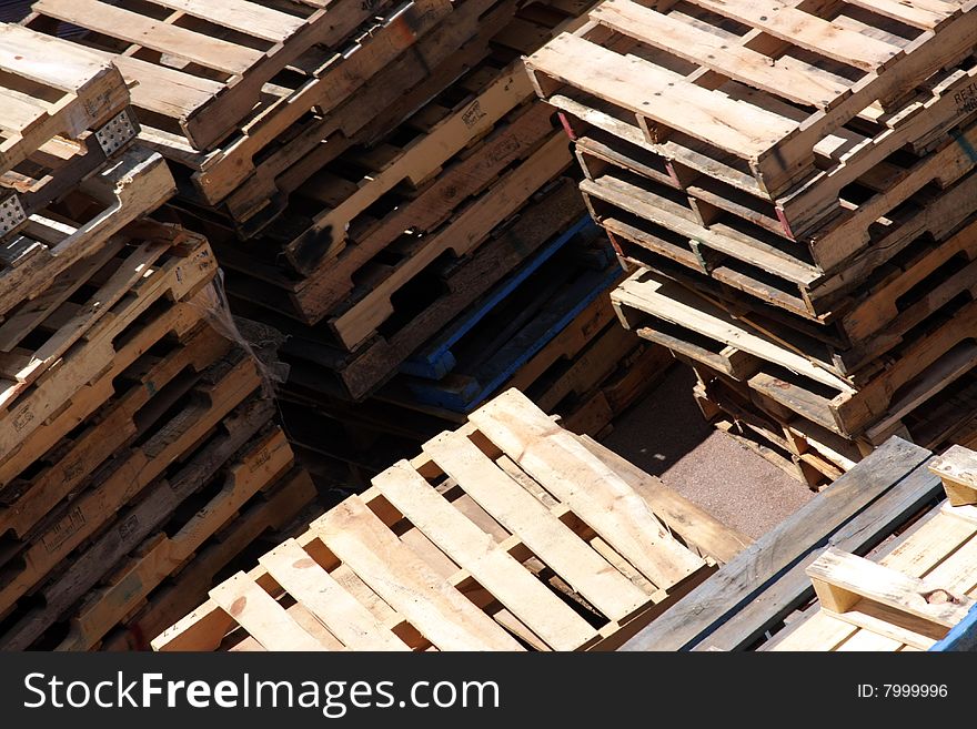 Stacks of timber pallets on a port. Stacks of timber pallets on a port
